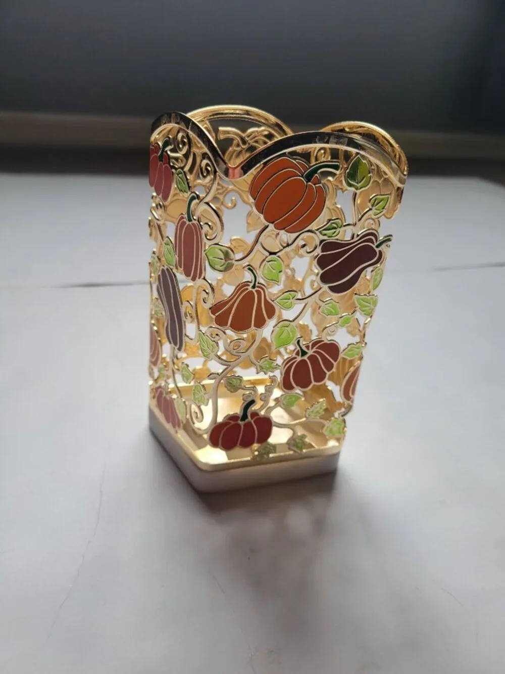 Bath & Body Works foaming soap holder features a festive gold metal pumpkin